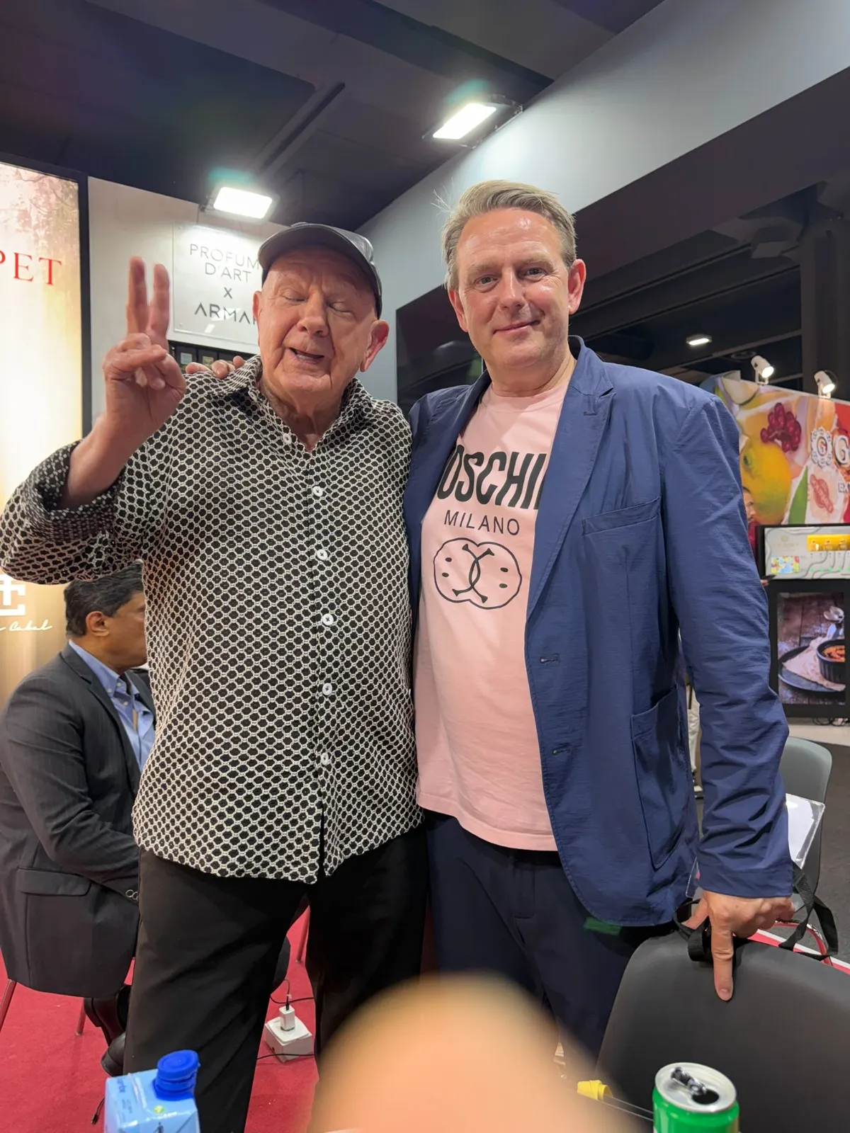 Kirk Thomason with a guest at the Parfums d’Arte x ARMAF stand