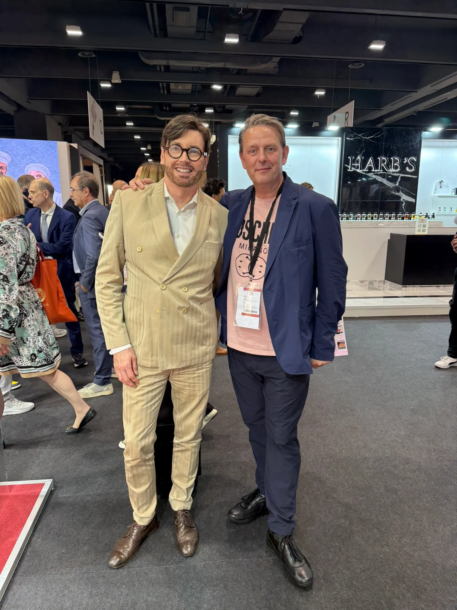 Kirk Thomason with a buyer at the HARB’S fragrance stand