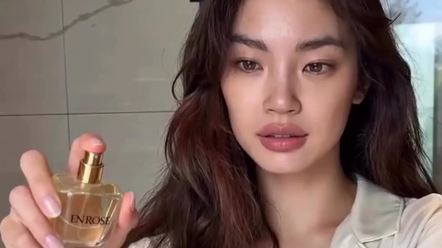 Creator filming a fragrance review for social