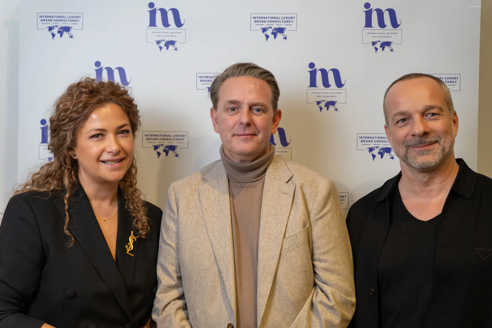 Kirk Thomason with industry partners at a beauty trade event